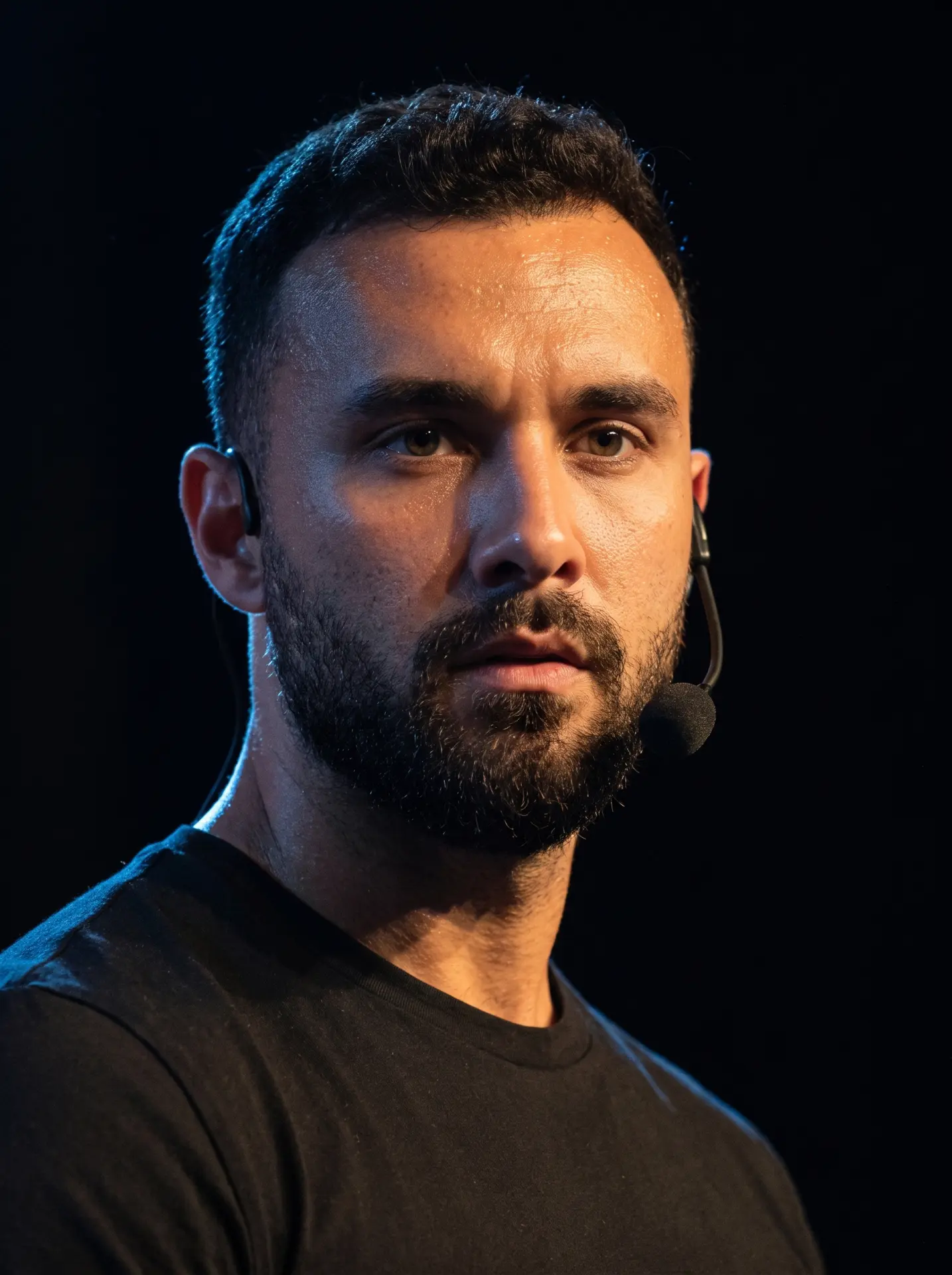 Noah Merriby, entrepreneur, wearing a headset microphone