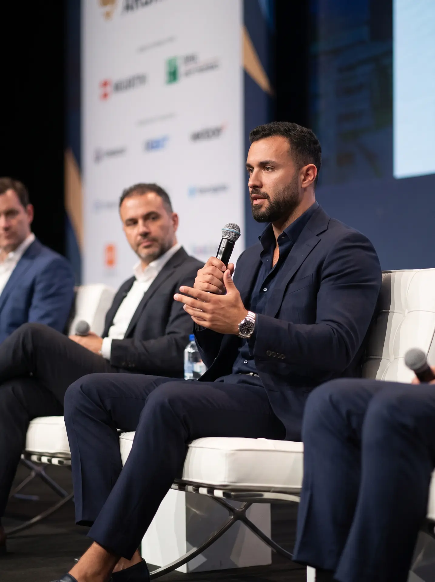 Noah Merriby speaking on a conference panel